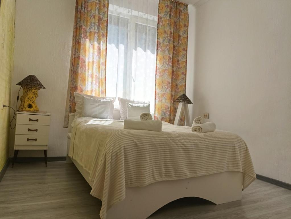 Postel nebo postele na pokoji v ubytování In House