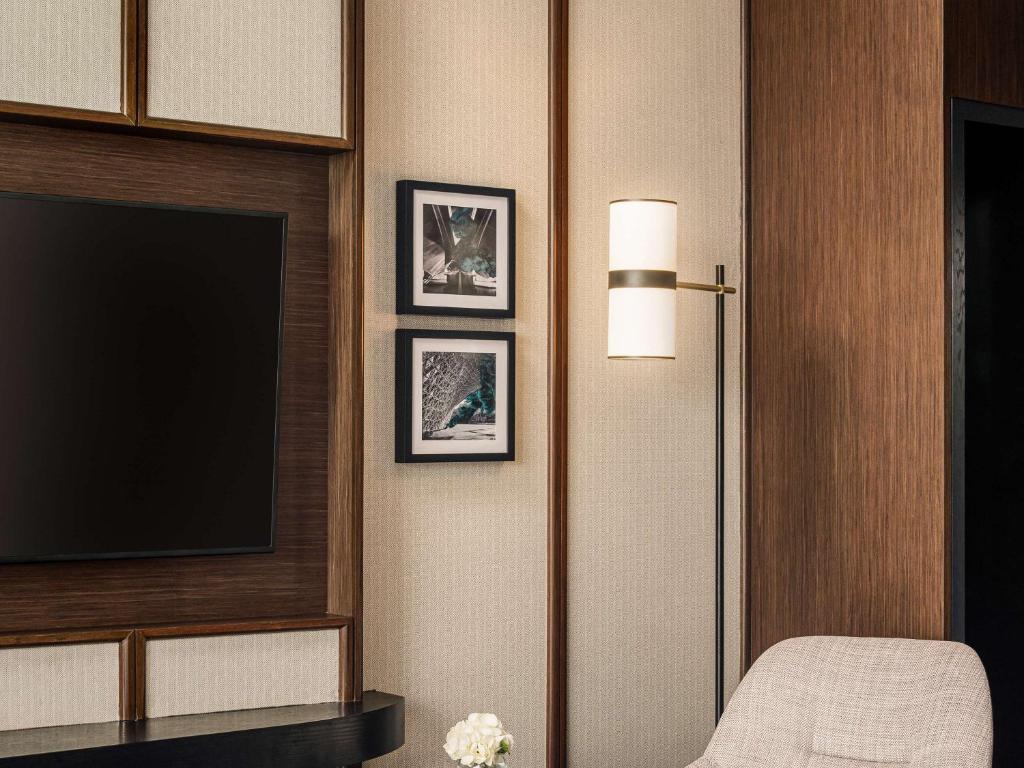 Fairmont Singapore客房内的一张或多张床位