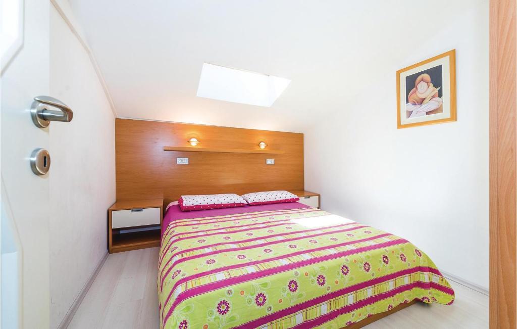 Postel nebo postele na pokoji v ubytování Apartment Augusta Senoe Iv