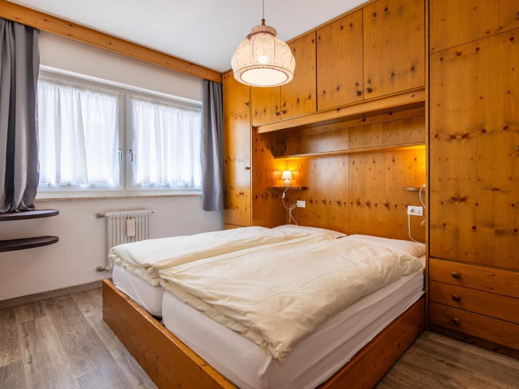 Posteľ alebo postele v izbe v ubytovaní Apartment Cesa Micheluzzi - CZI712 by Interhome