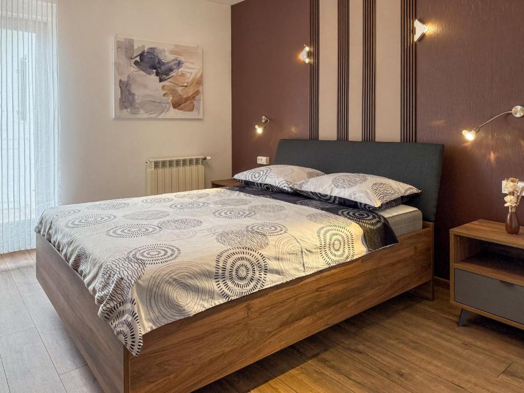 Postel nebo postele na pokoji v ubytování Holiday Home M by Interhome
