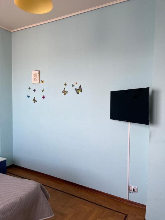 TV a/nebo společenská místnost v ubytování Boutique Affittacamere Attico In Centro