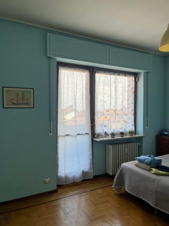 Postel nebo postele na pokoji v ubytování Boutique Affittacamere Attico In Centro