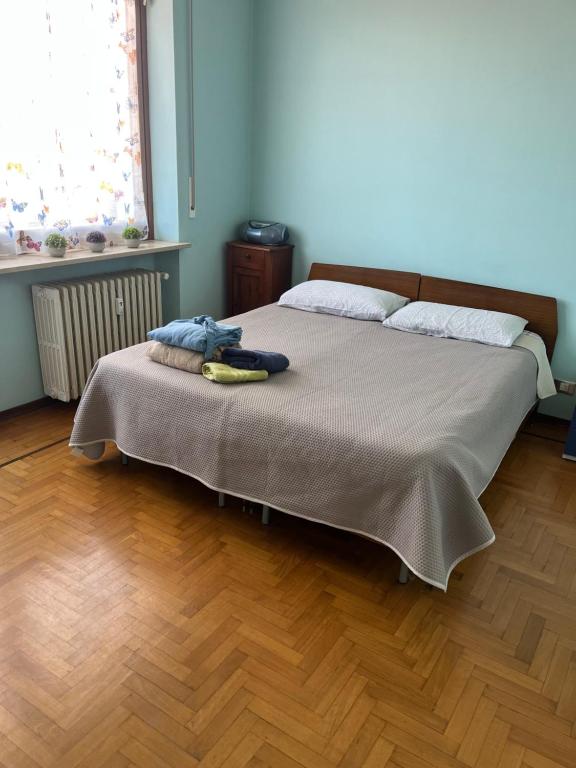 Postel nebo postele na pokoji v ubytování Boutique Affittacamere Attico In Centro