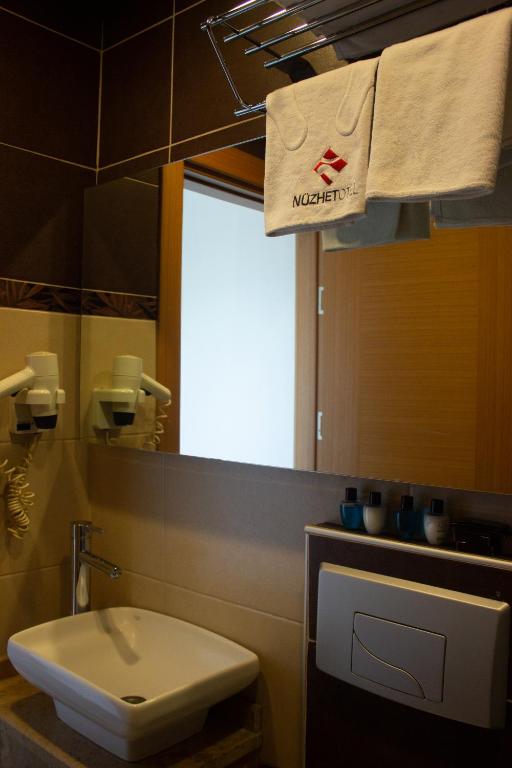 Koupelna v ubytování Nüzhet Hotel