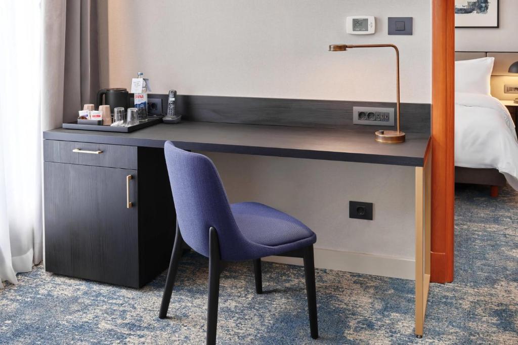 Kuchyň nebo kuchyňský kout v ubytování Hotel International by Maistra City Vibes