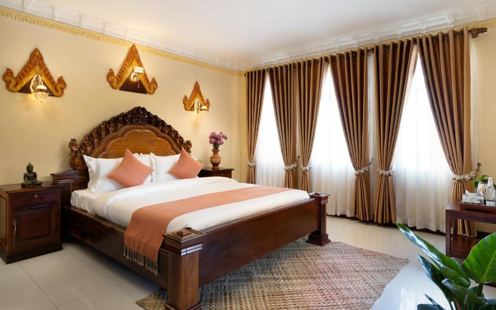Postel nebo postele na pokoji v ubytování Bronam Residence & Spa