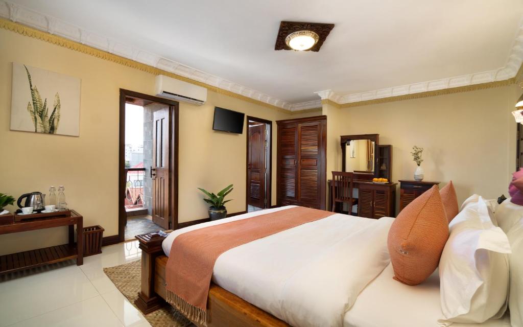 Postel nebo postele na pokoji v ubytování Bronam Residence & Spa
