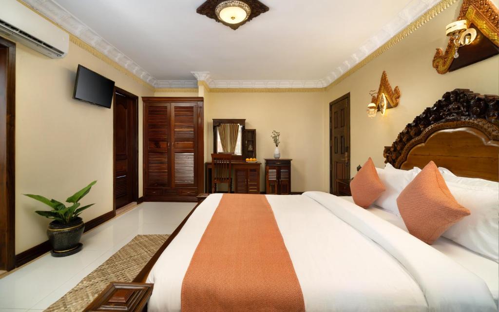 Postel nebo postele na pokoji v ubytování Bronam Residence & Spa