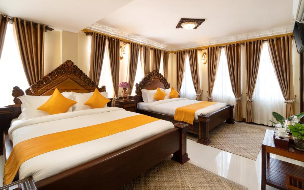 Postel nebo postele na pokoji v ubytování Bronam Residence & Spa