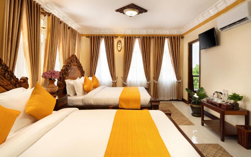 Postel nebo postele na pokoji v ubytování Bronam Residence & Spa