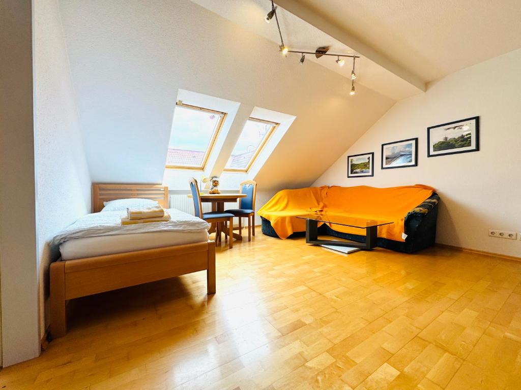 Postelja oz. postelje v sobi nastanitve E&C Pension Rooms