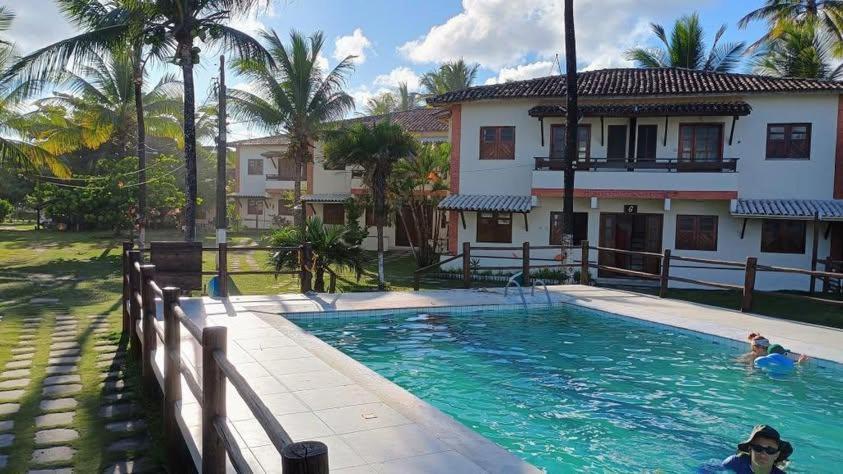 Πισίνα στο ή κοντά στο Casa de praia em condomínio Japará ilhéus Bahia