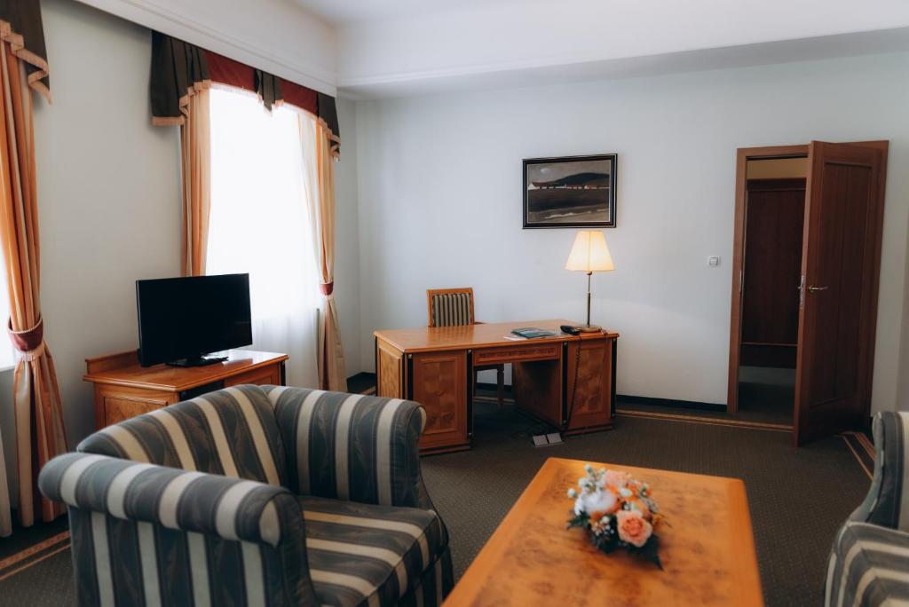 TV a/nebo společenská místnost v ubytování Parkhotel Golf Marianske Lazne