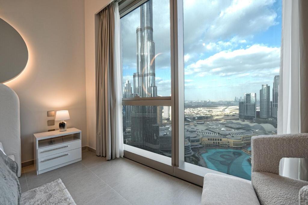 تصویر اتاق‌های Venetian - Refined 2BR at Grande Tower, Burj & Fountain views - تصویر ۲