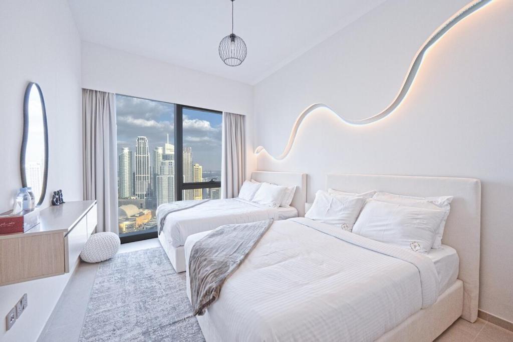 فضای داخلی Venetian - Refined 2BR at Grande Tower, Burj & Fountain views در دبی - تصویر ۳