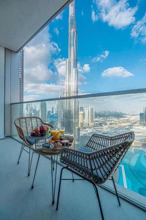 Venetian - Refined 2BR at Grande Tower, Burj & Fountain views در دبی