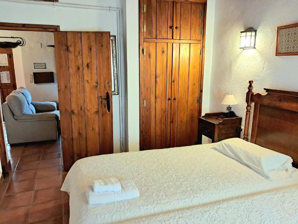 Cama o camas de una habitación en El Jiniebro Turismo Rural