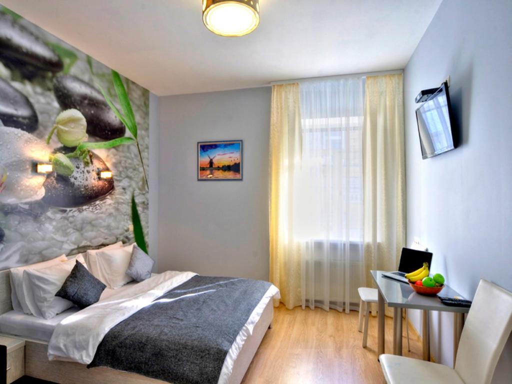 Postel nebo postele na pokoji v ubytování Golden Gate Inn