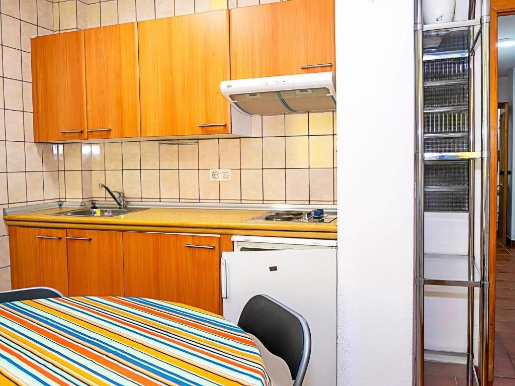 Kuchnia lub aneks kuchenny w obiekcie Apartamento