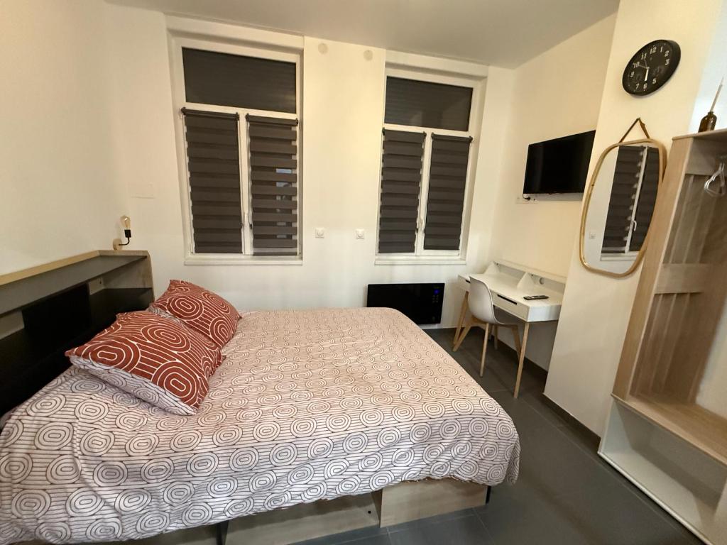 Ένα ή περισσότερα κρεβάτια σε δωμάτιο στο Apartment Lille-Fives