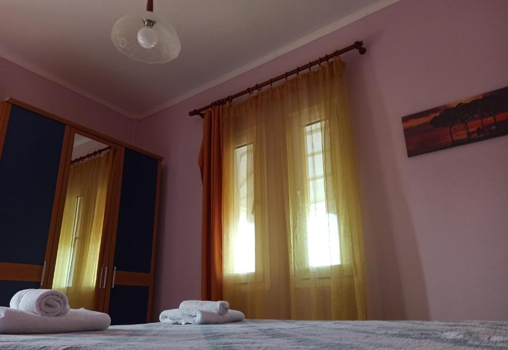 A bed or beds in a room at The Emerald Lopi, 2km from Ammolofoi beach! The best kept secret in nature, of Nea Peramos