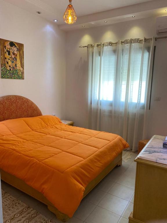 Postel nebo postele na pokoji v ubytování Le Coin Paradisiaque