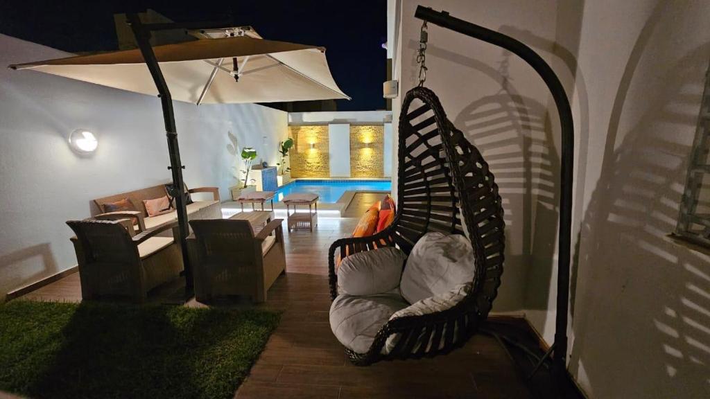 Posezení v ubytování Le Coin Paradisiaque