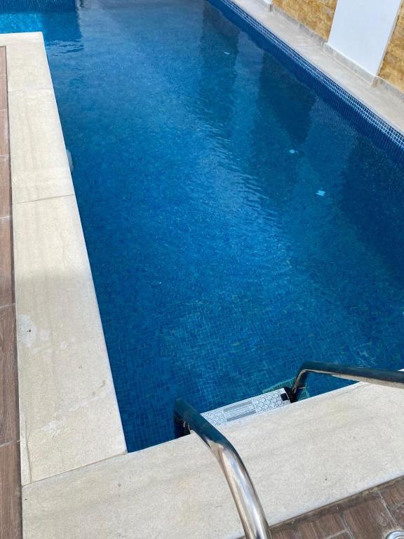 Bazén v ubytování Le Coin Paradisiaque nebo v jeho okolí