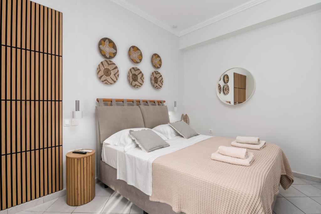 Postel nebo postele na pokoji v ubytování Melian Roots Apartment