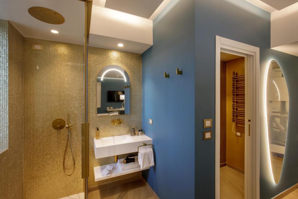 Koupelna v ubytování Ambasciatori Suite Hotel