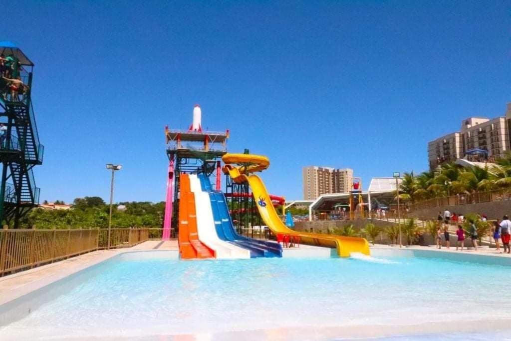 a colorful water slide in a water park at Hotel Piazza diRoma com acesso ao Acqua Park e Splash in Caldas Novas