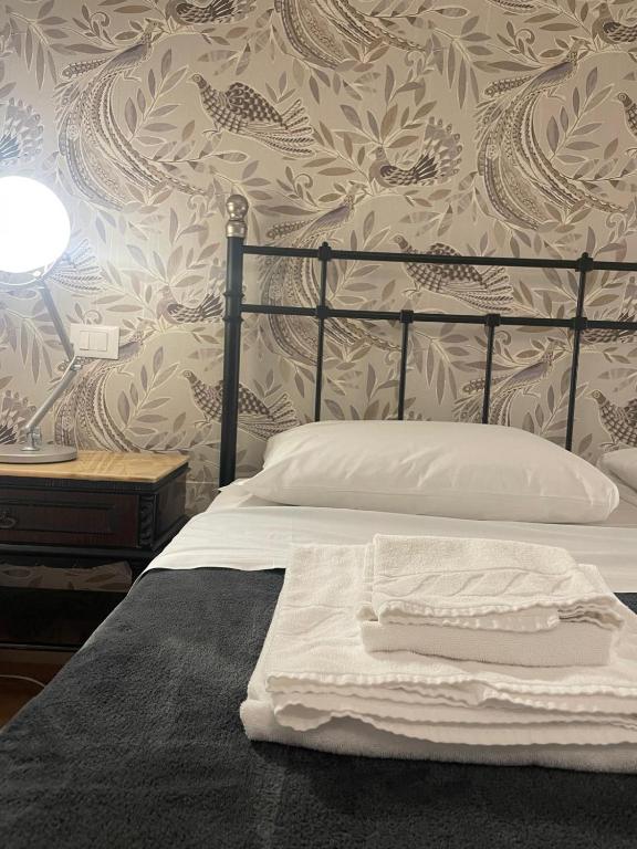 Posteľ alebo postele v izbe v ubytovaní B&B Madam Treviso
