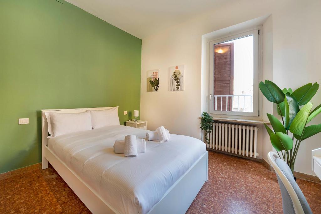 Postel nebo postele na pokoji v ubytování Italianflat - University rooms