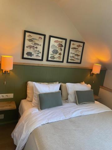 Postel nebo postele na pokoji v ubytování Hotel Louisa