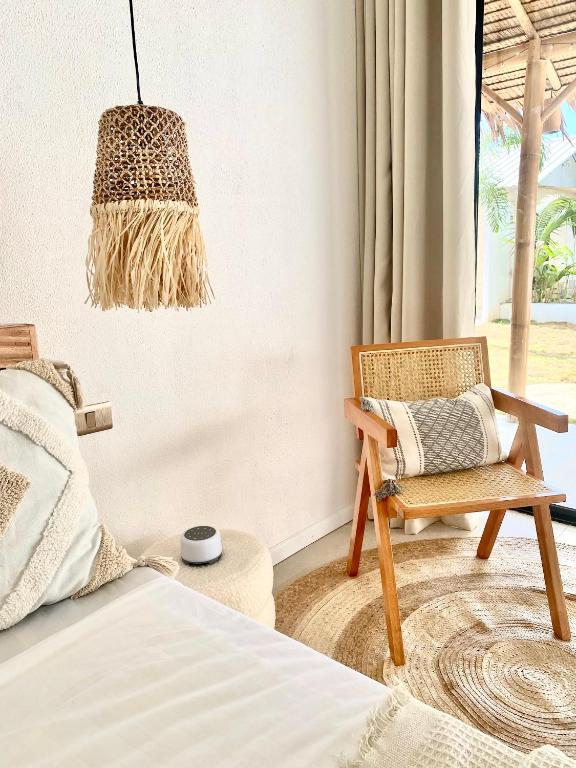 Letto o letti in una camera di CASA BUKO Tropical Homes El Nido
