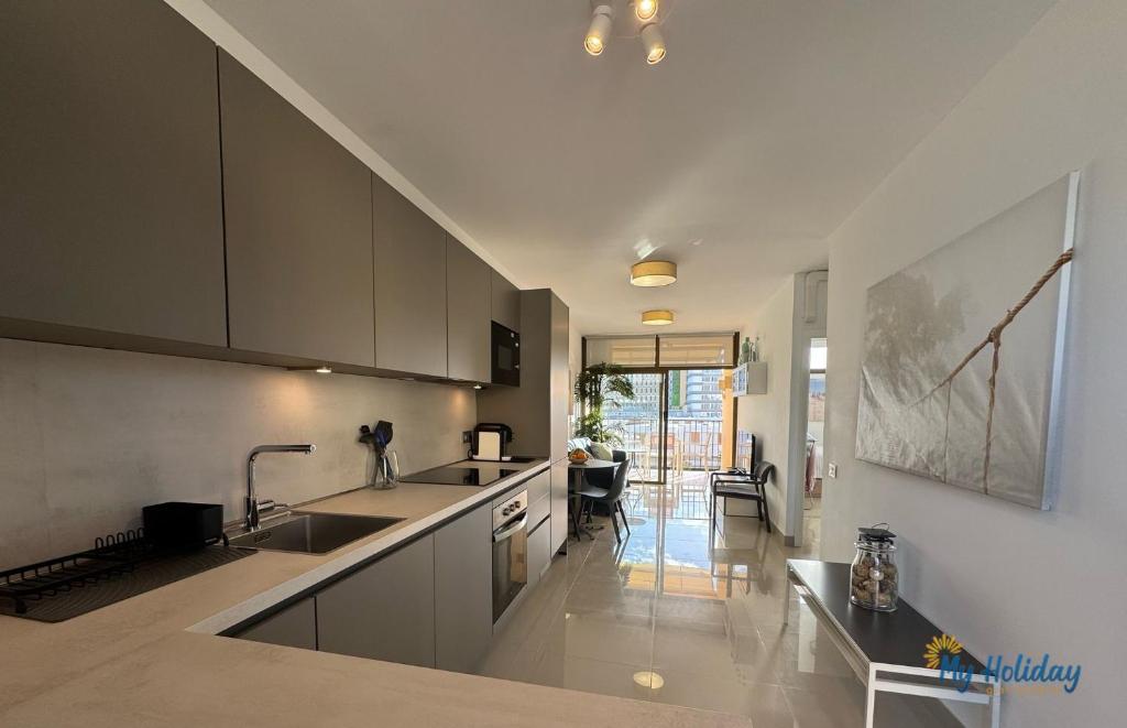 a kitchen with a sink and a counter top at Blue Beach in Playa del Ingles