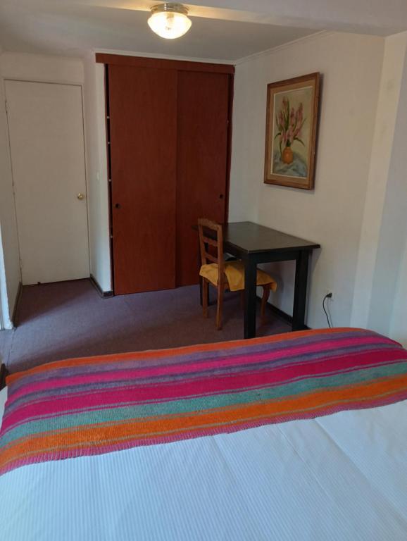 Postelja oz. postelje v sobi nastanitve La Cascarona