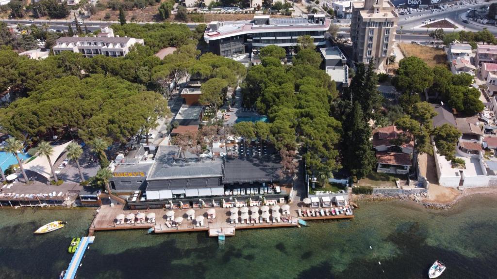 an aerial view of a mansion on the water at Unique Life Style Hotel in Kuşadası