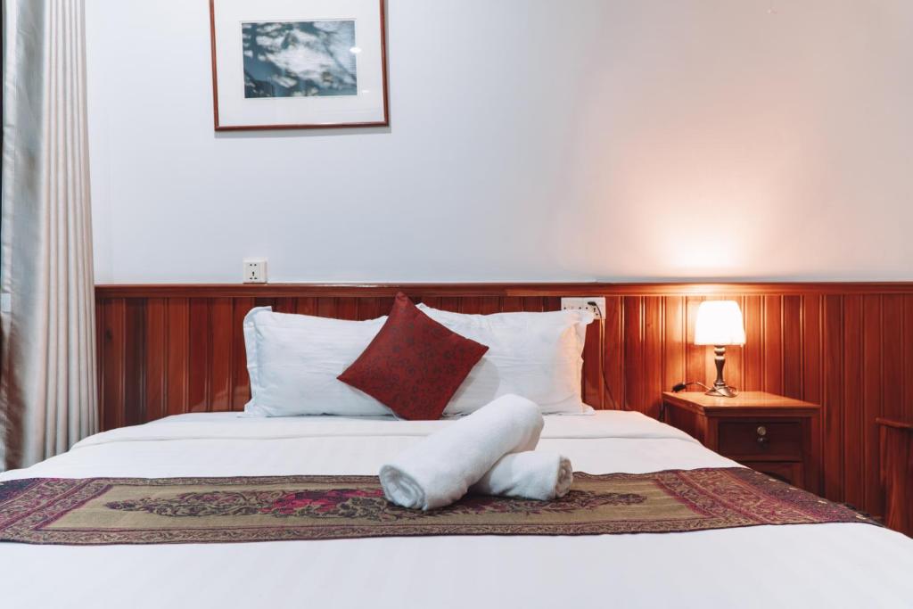 Postel nebo postele na pokoji v ubytování MONY SOKSAN Residence