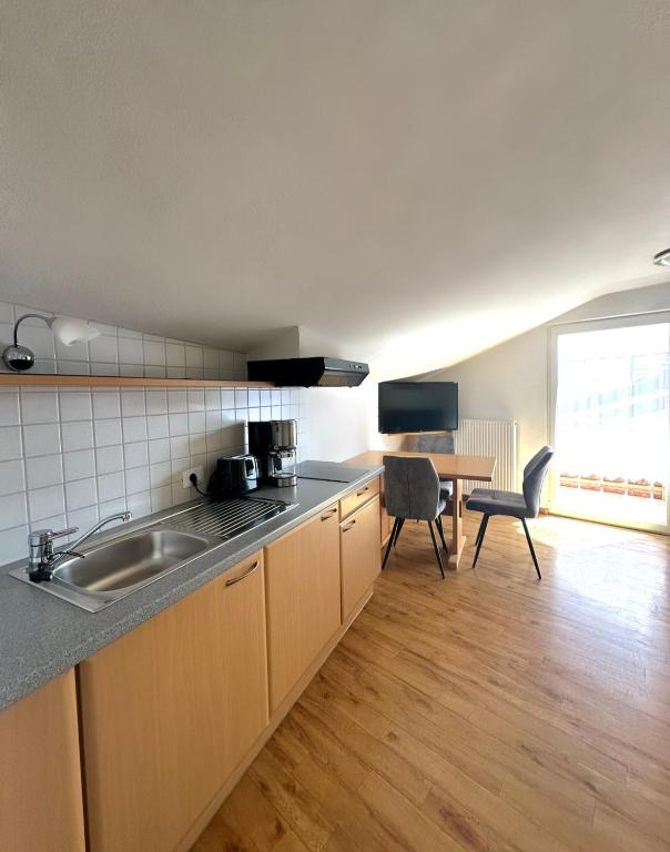 Kuchyň nebo kuchyňský kout v ubytování Garni Hotel Dorothea