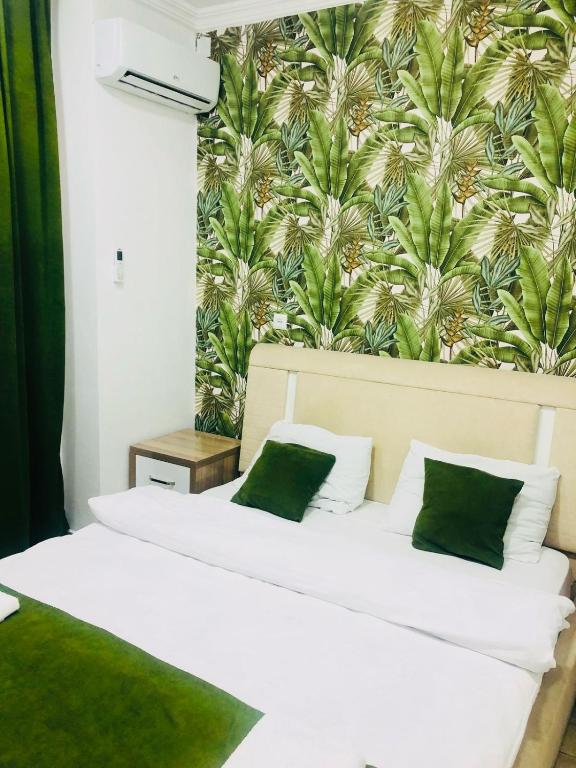 Postel nebo postele na pokoji v ubytování Gegas hotel