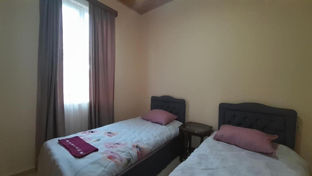 Postel nebo postele na pokoji v ubytování BaBa guesthouse