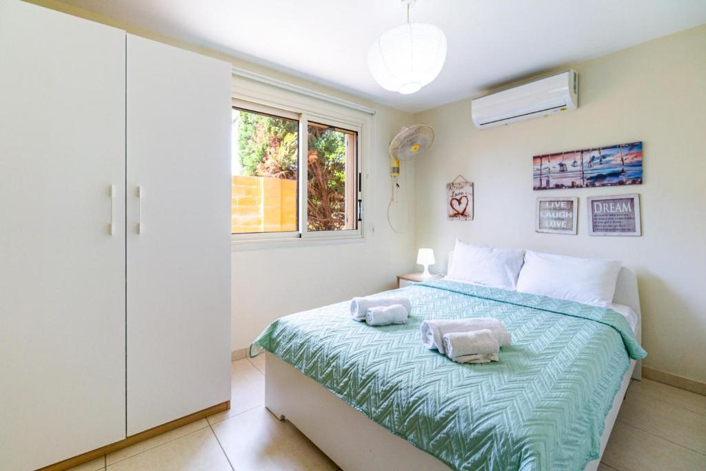 Postel nebo postele na pokoji v ubytování Villa Venus by Ezoria Villas