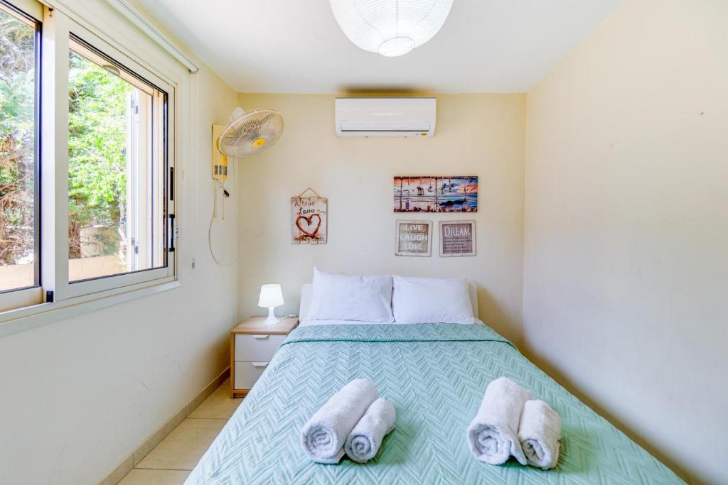 Postel nebo postele na pokoji v ubytování Villa Venus by Ezoria Villas