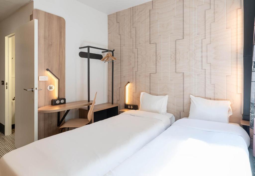 Postel nebo postele na pokoji v ubytování B&B HOTEL Lyon Ouest Tassin