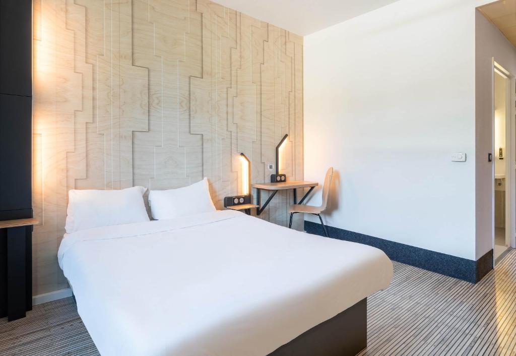 Postel nebo postele na pokoji v ubytování B&B HOTEL Lyon Ouest Tassin