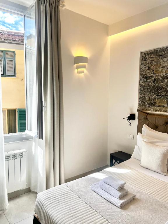 Postel nebo postele na pokoji v ubytování Sunset rooms