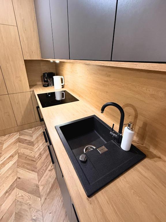 Kuchyňa alebo kuchynka v ubytovaní Apartament Bubble z darmowym parkingiem