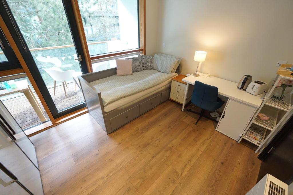 Kuchyň nebo kuchyňský kout v ubytování 1-bedroom business hub easy life